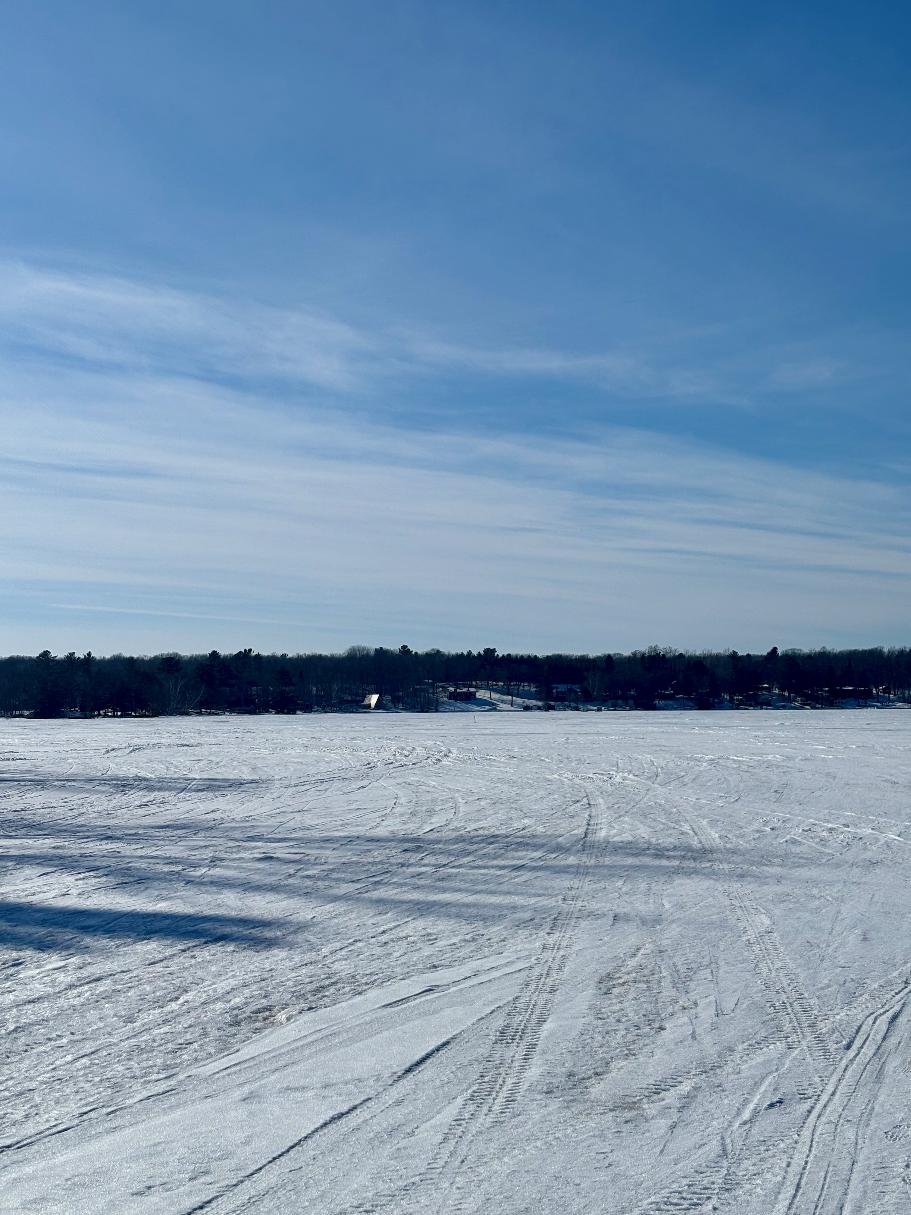 Cabin across the frozen lake